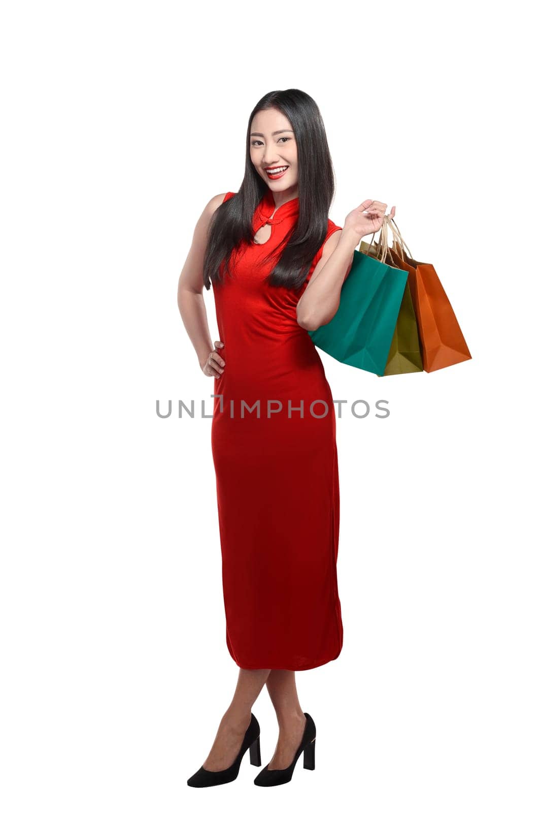 Chinese woman holding shopping bag. Happy chinese new year concept