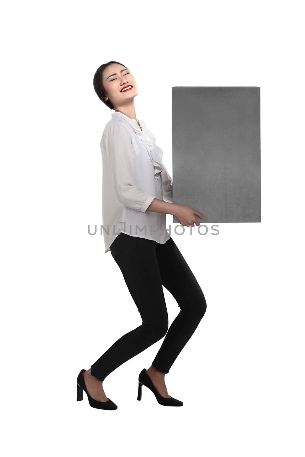 Asian business woman lift heavy box isolated over white background