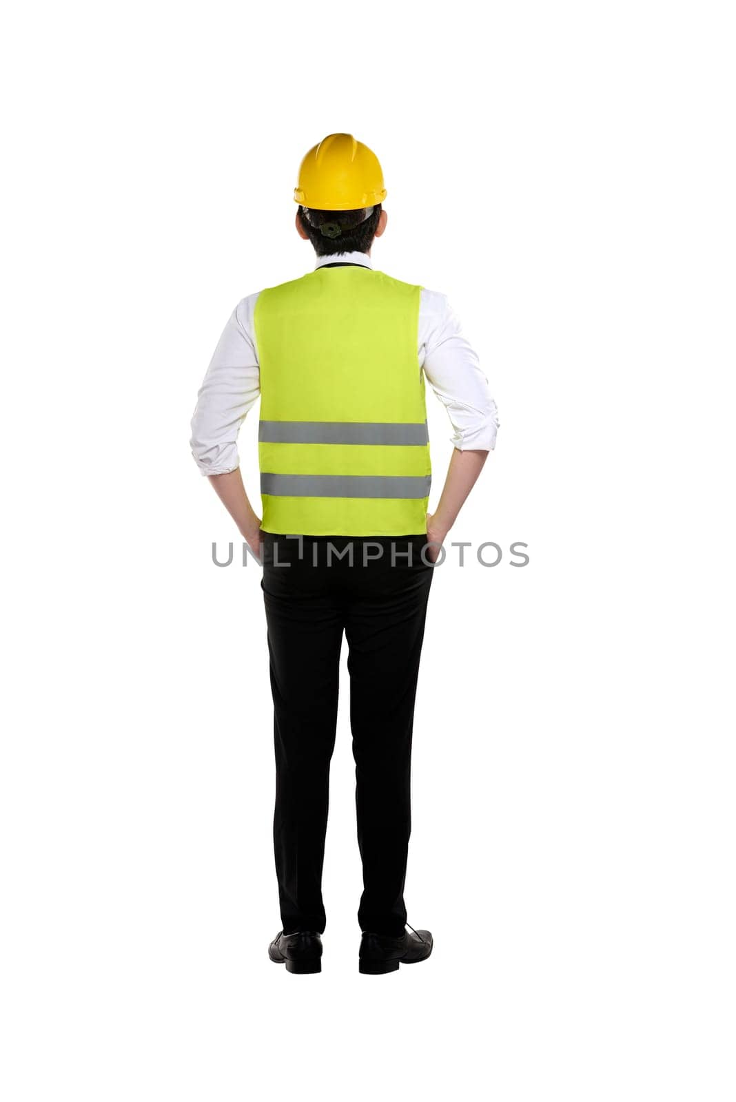 Back view of asian worker wearing safety vest and yellow helmet isolated over white background