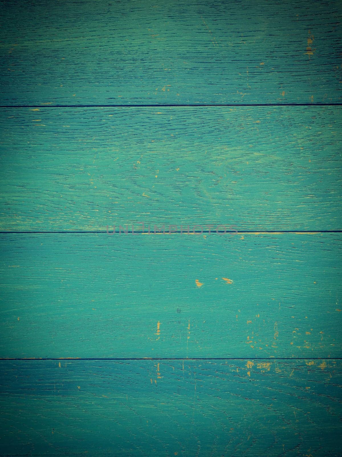 Weathered old wooden plank in vintage blue using as background