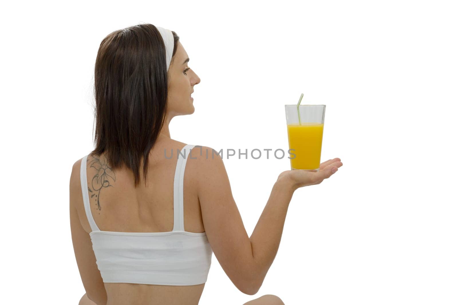 a beautiful young woman with orange juice