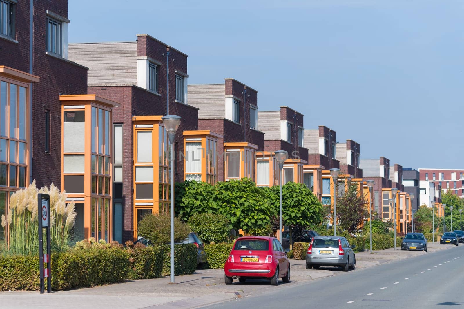 LENT, NETHERLANDS - SEPTEMBER 24, 2016: Modern residential area with identical townhouses