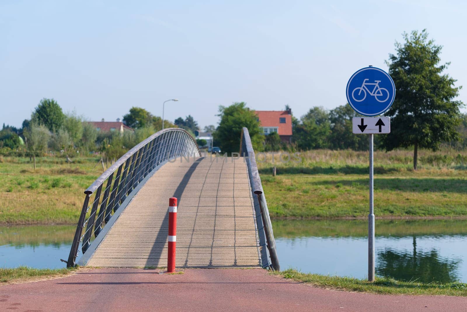 small bicycle bridge over a canal
