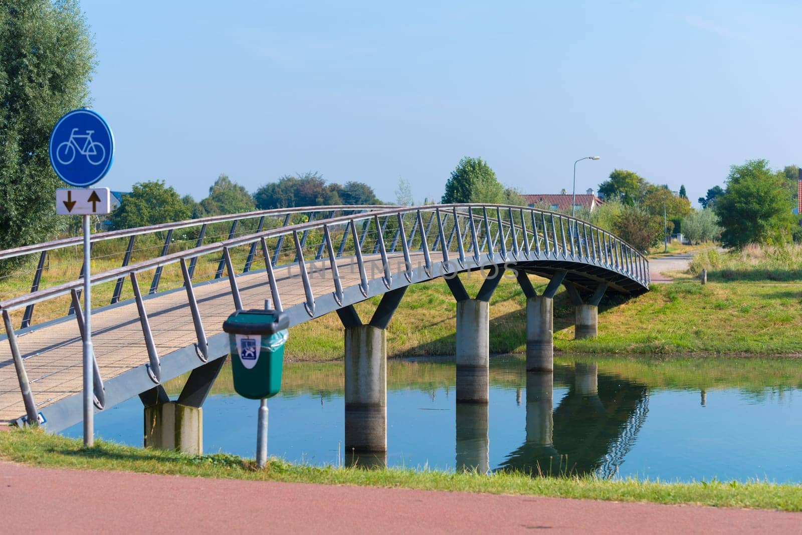 small bicycle bridge over a canal