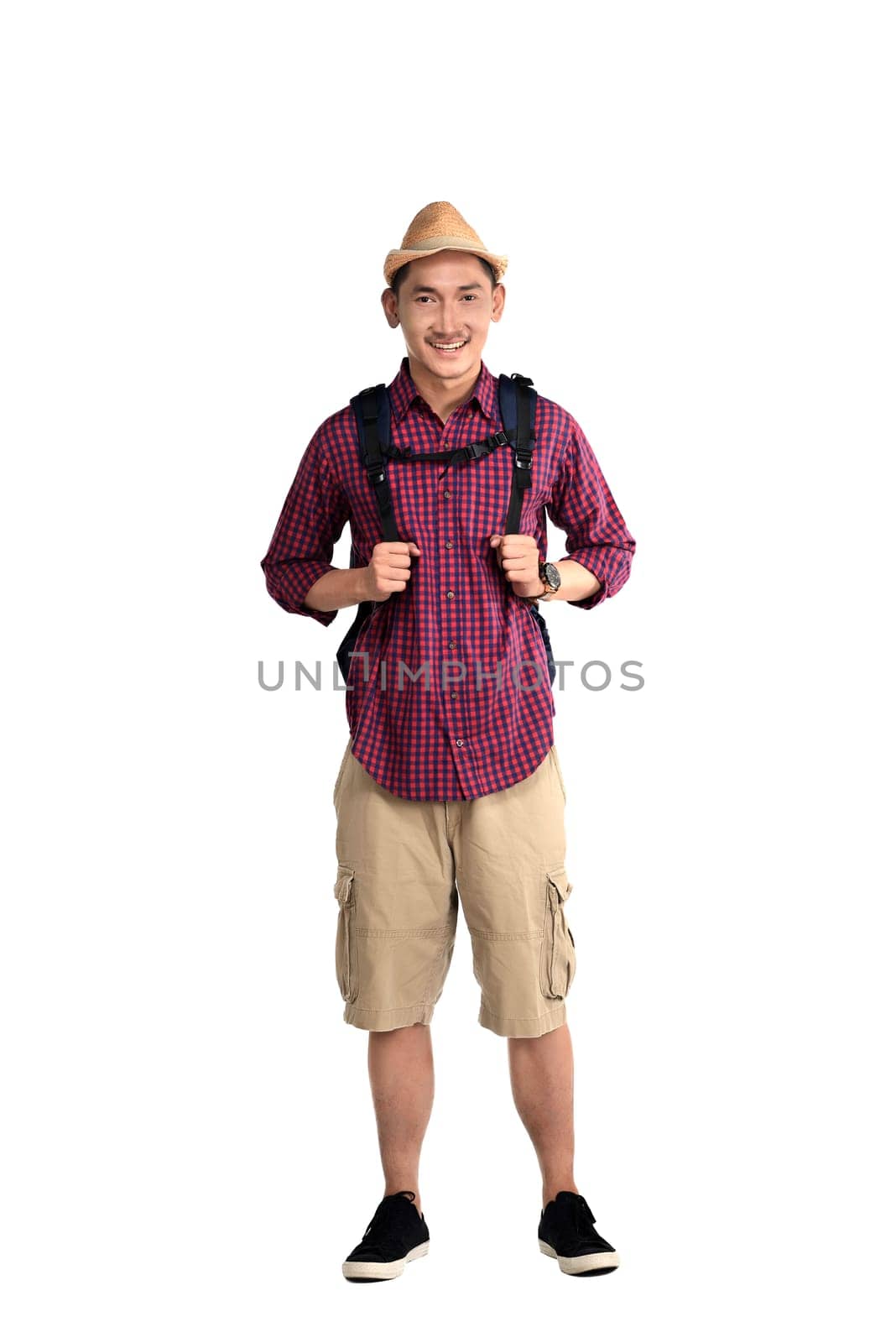 Asian traveler guy wearing backpack and hat isolated over white background