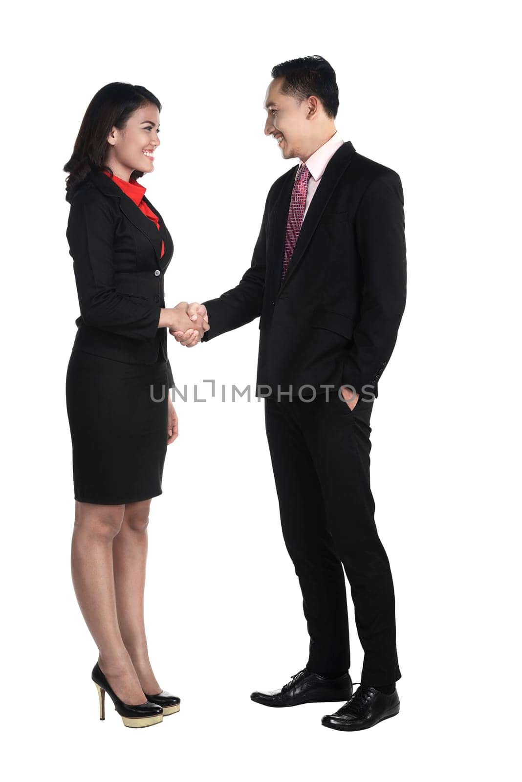 Business man and woman shake hand isolated over white background