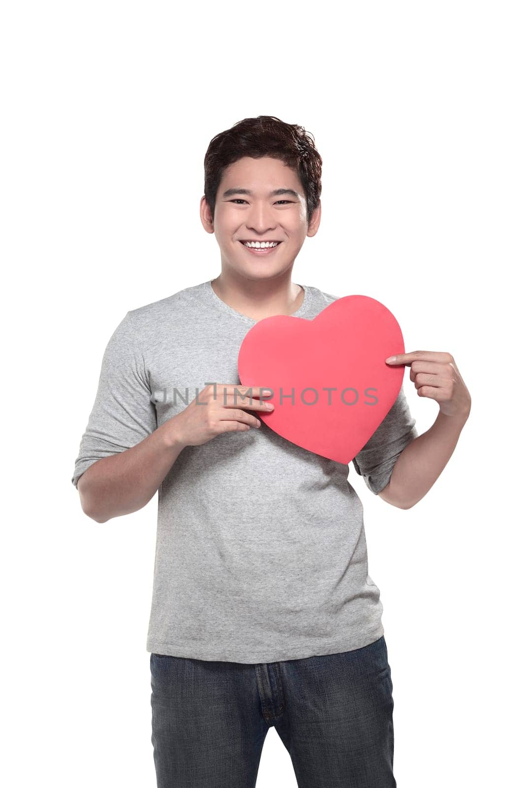 Asian man holding red heart. Valentine's day concept