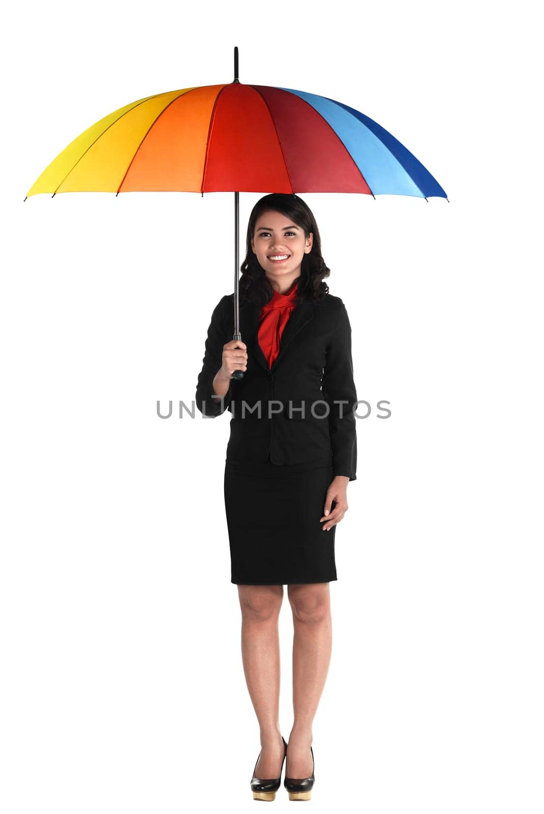 Business woman holding colorful umbrella isolated over white background