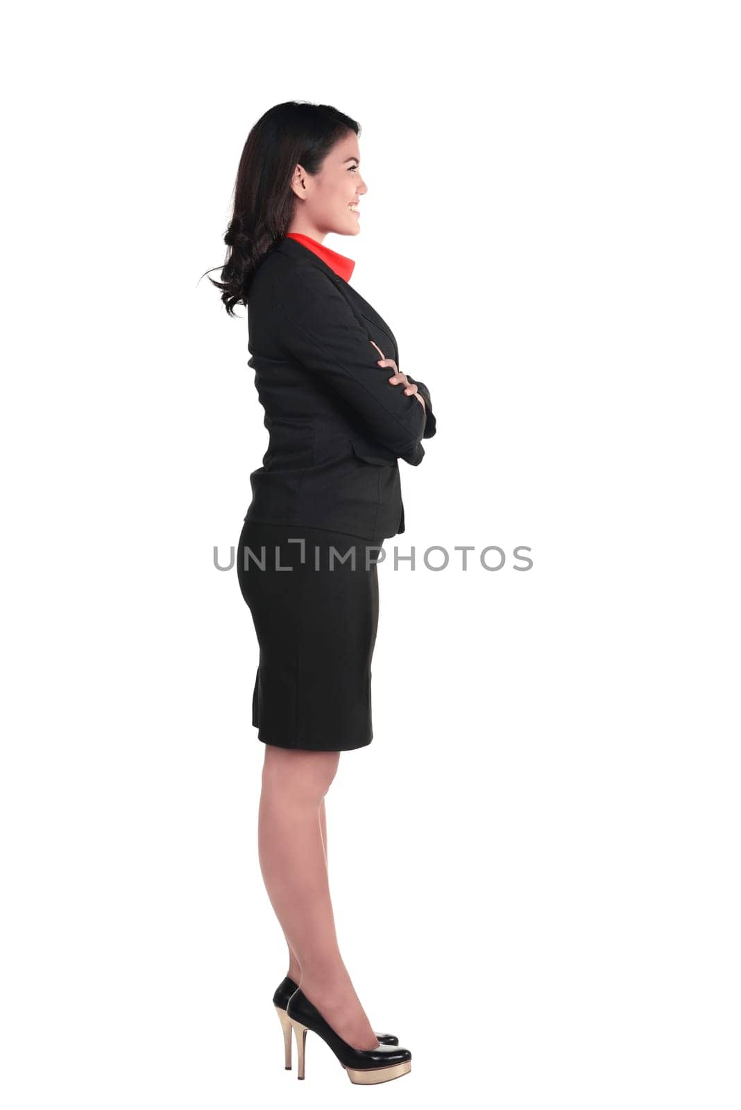 Asian business woman standing side view isolated over white background