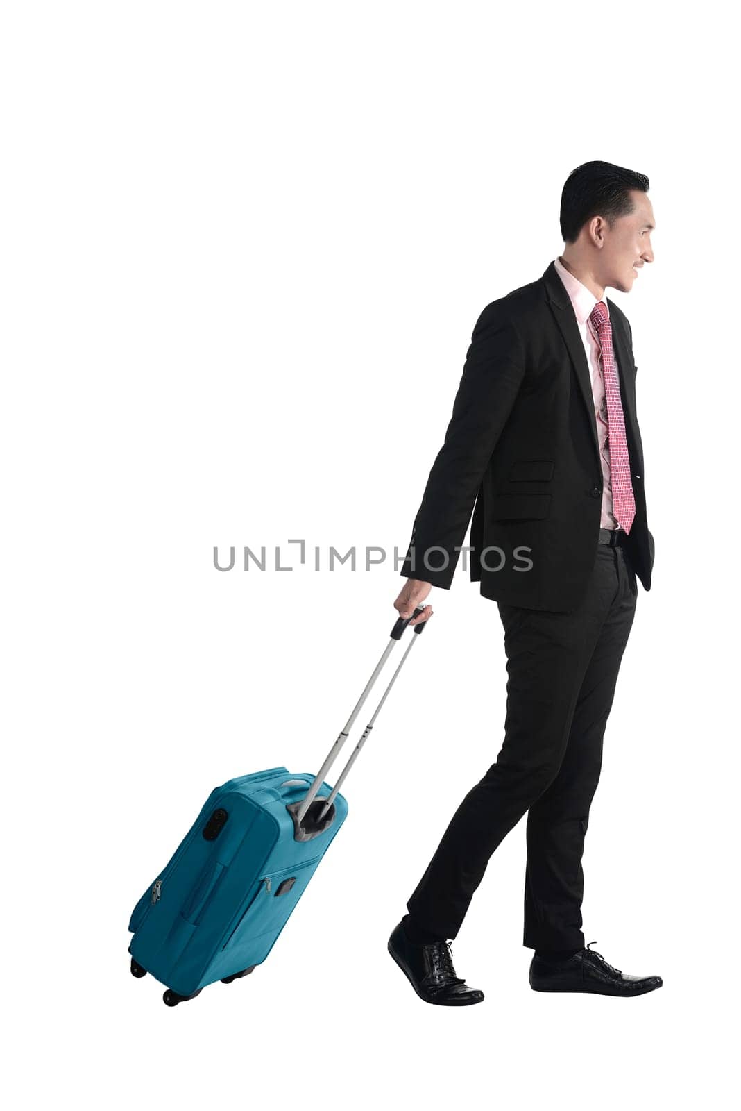 Business man walking with suitcase isolated over white background
