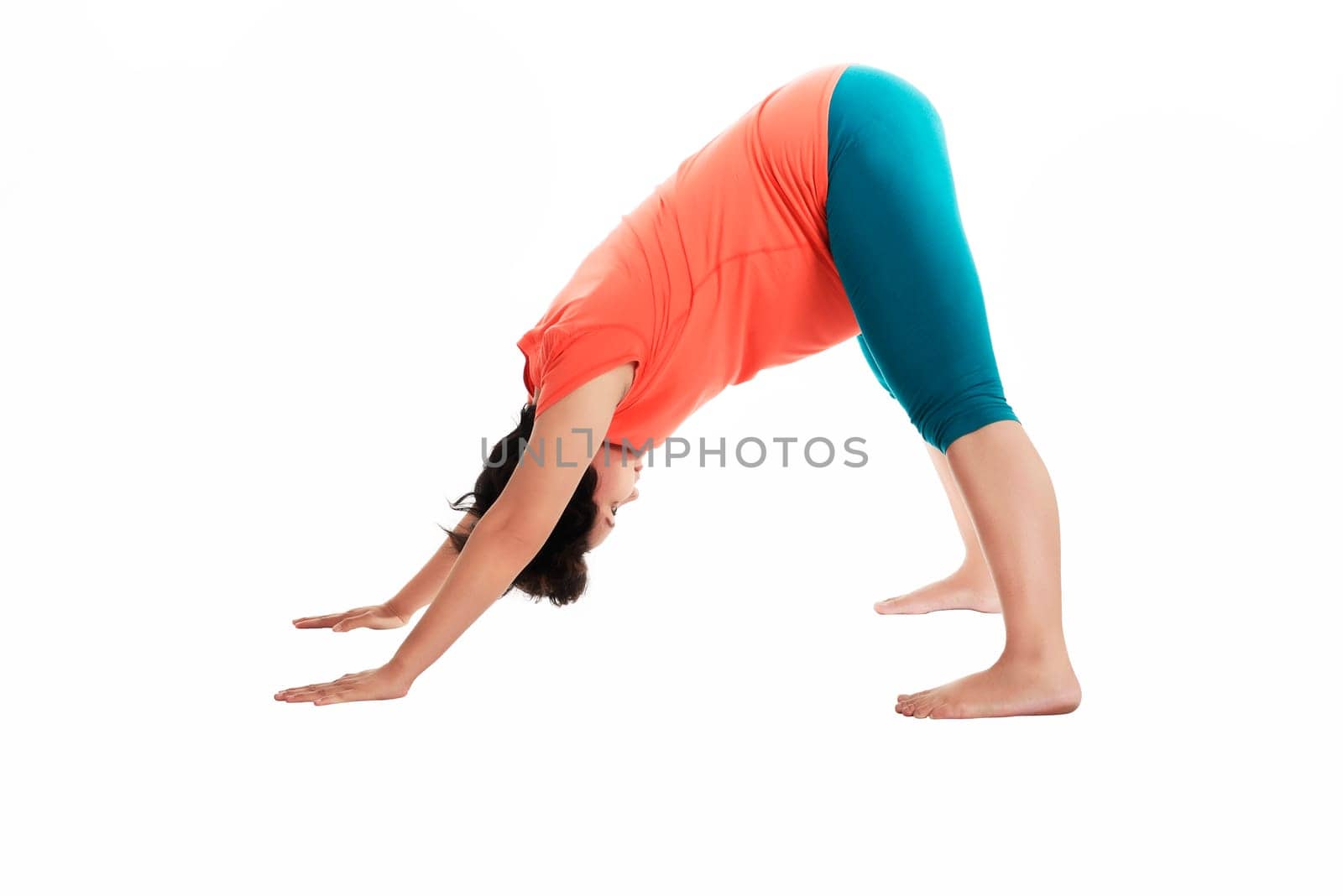 Asian pregnant woman doing yoga over isolated white background