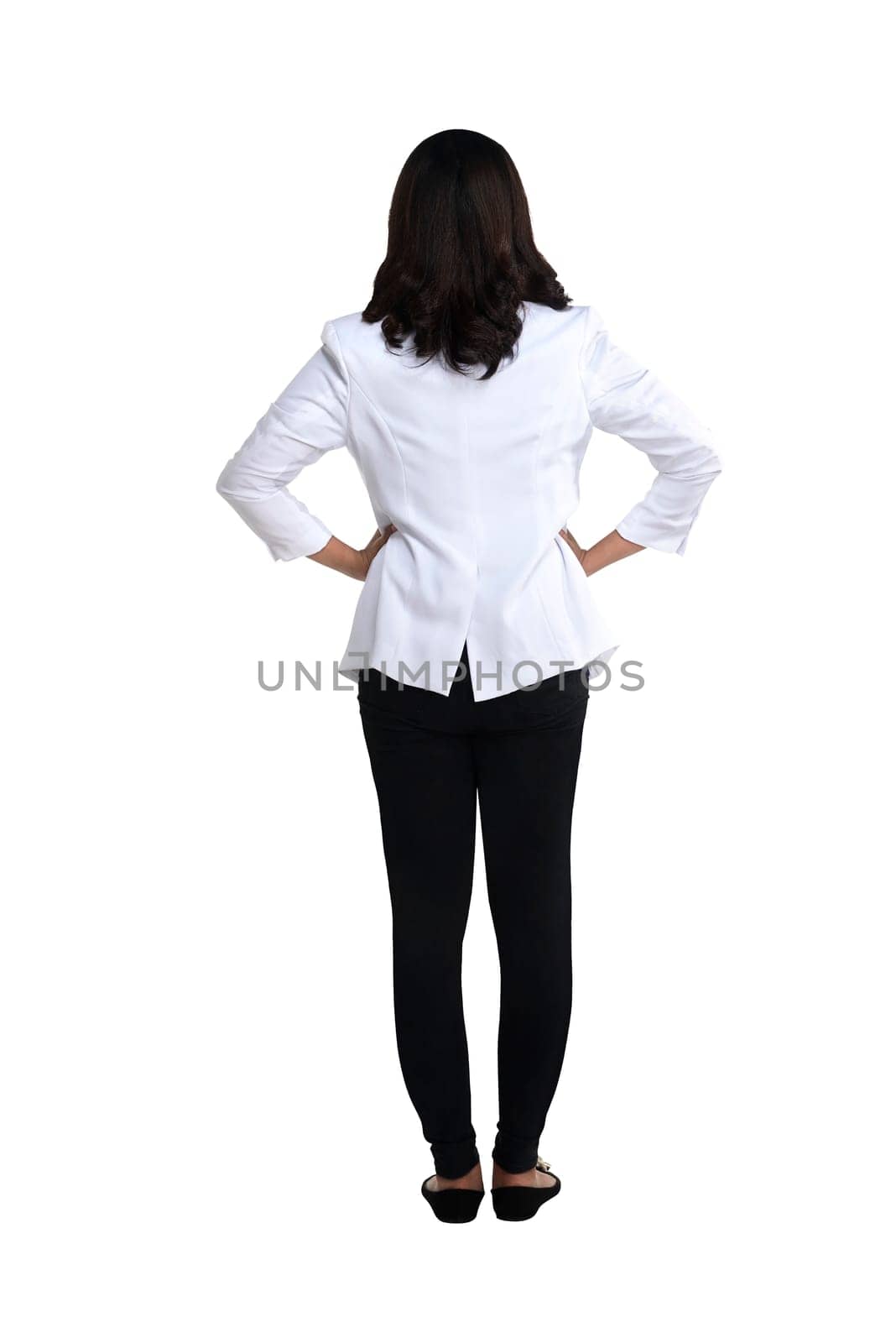 Back view of a female doctor looking at white. Full length shot