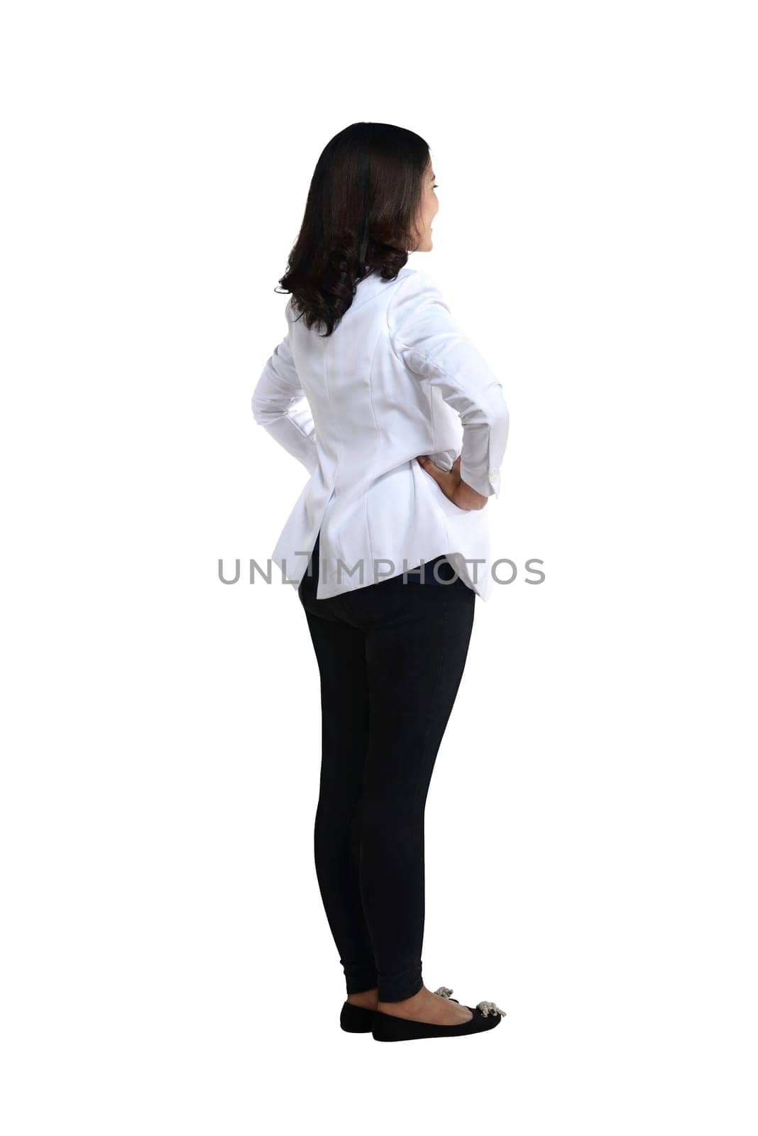 Back view of a female doctor looking at white. Full length shot