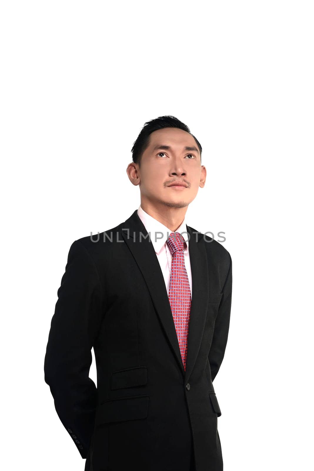 Asian man looking up isolated over white background
