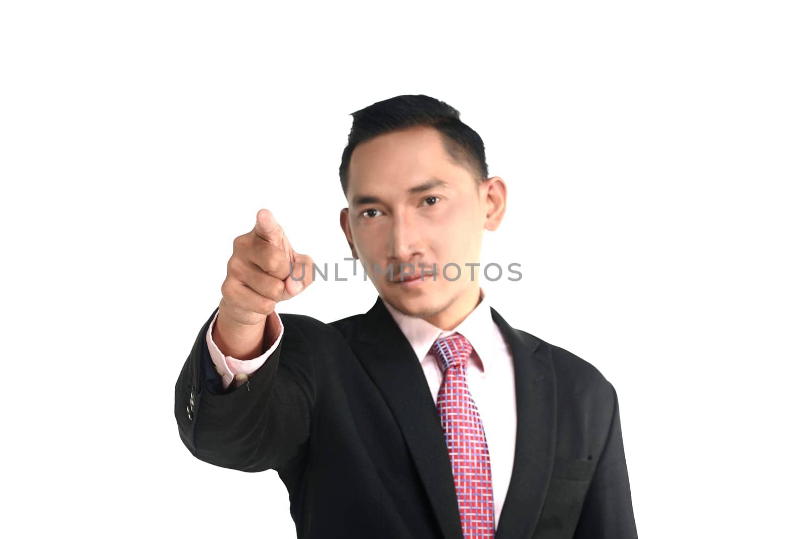 Asian business man pointing something isolated over white background