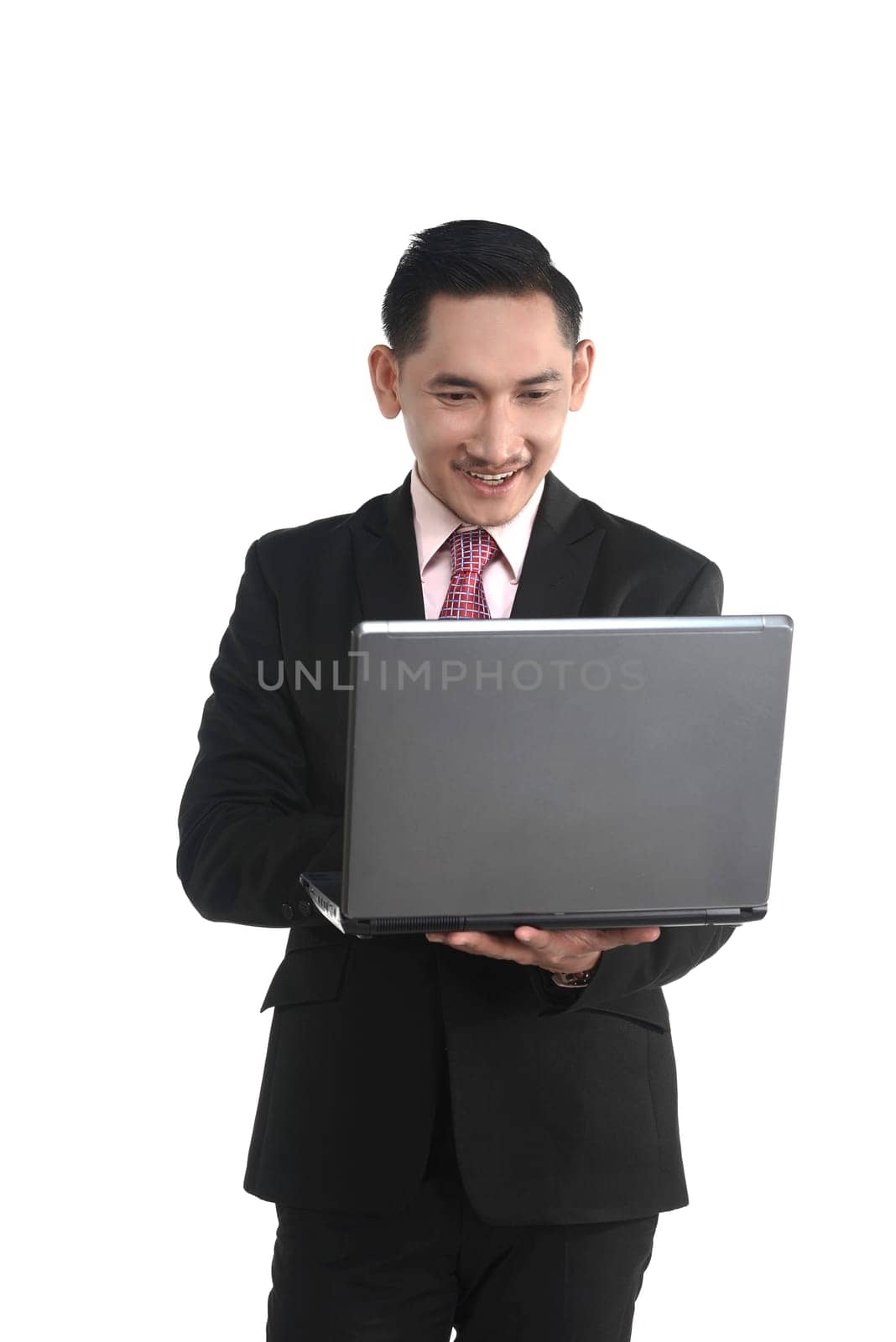 Asian business man holding laptop isolated over white background