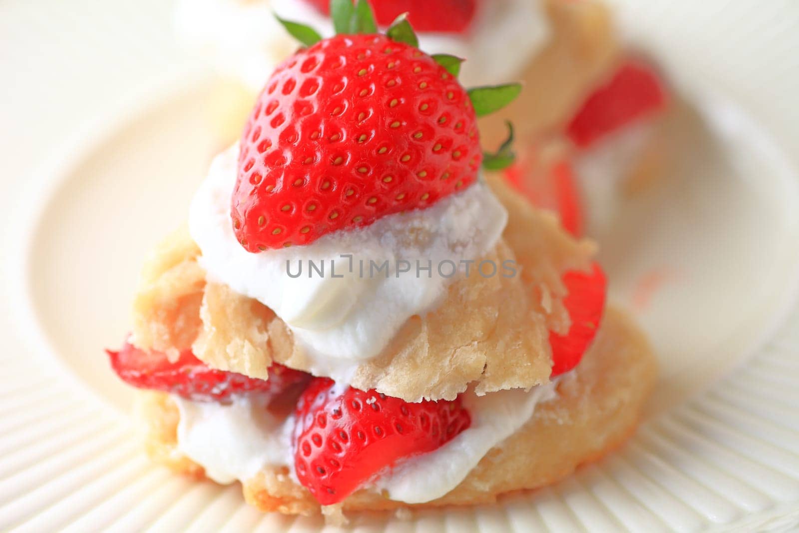 Small fresh strawberry shortcakes closeup