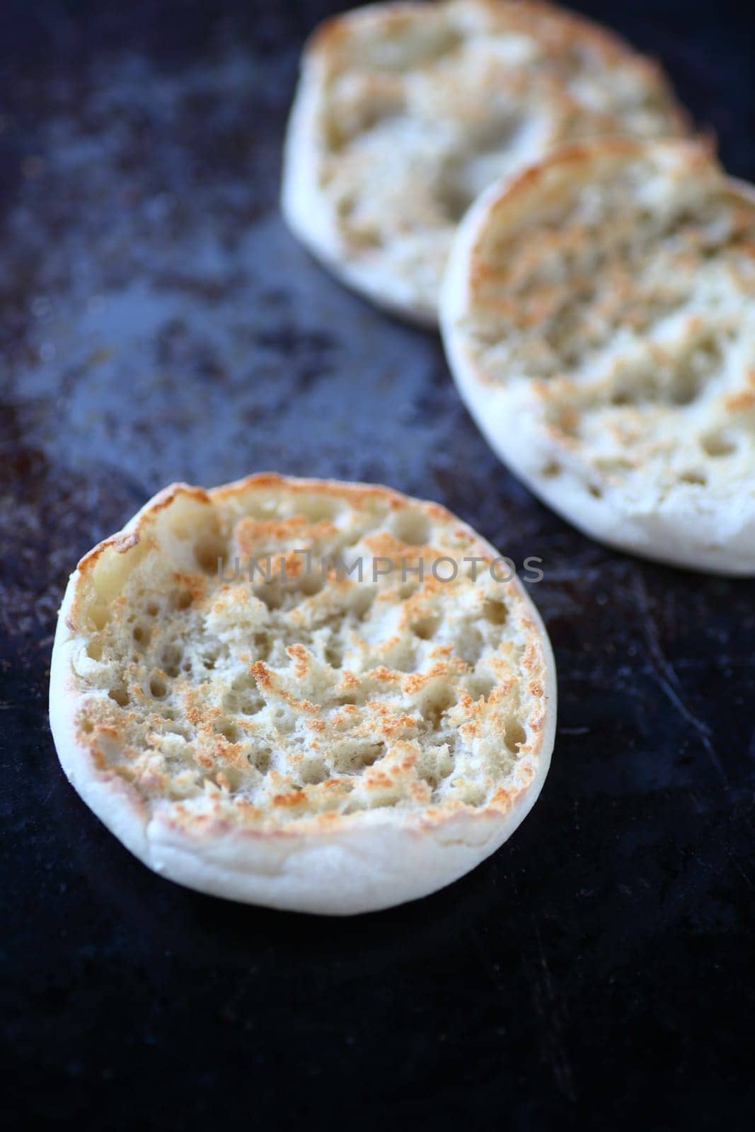Overhead of toasted English muffins