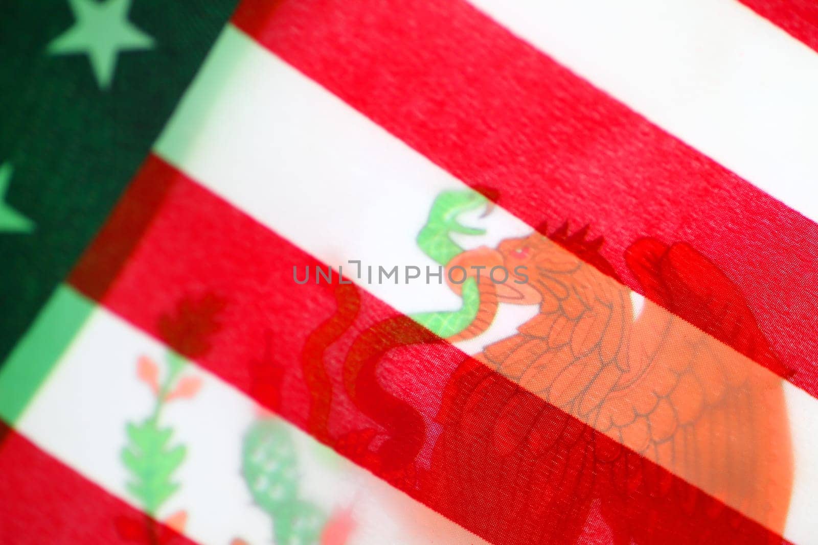 One country’s flag seen behind the other