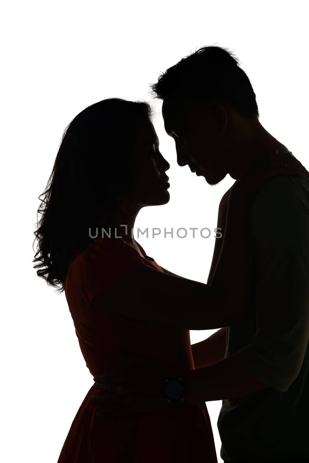 Silhouette man and woman isolated over white background