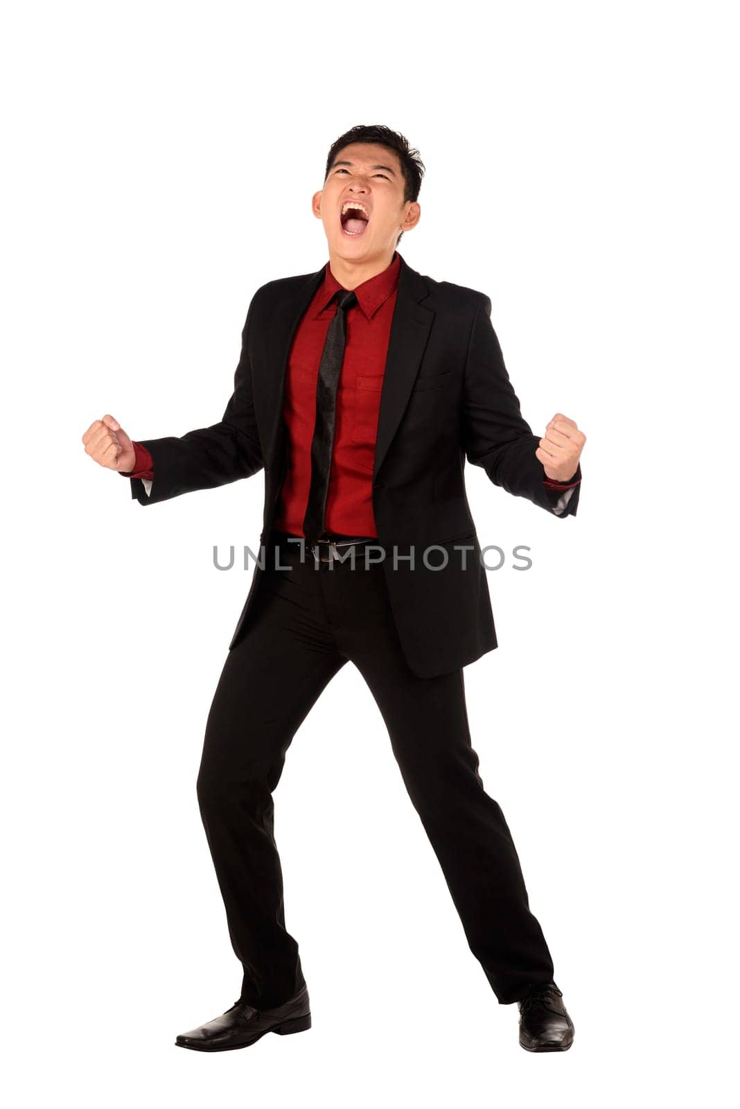 Business man screaming happy isolated over white background