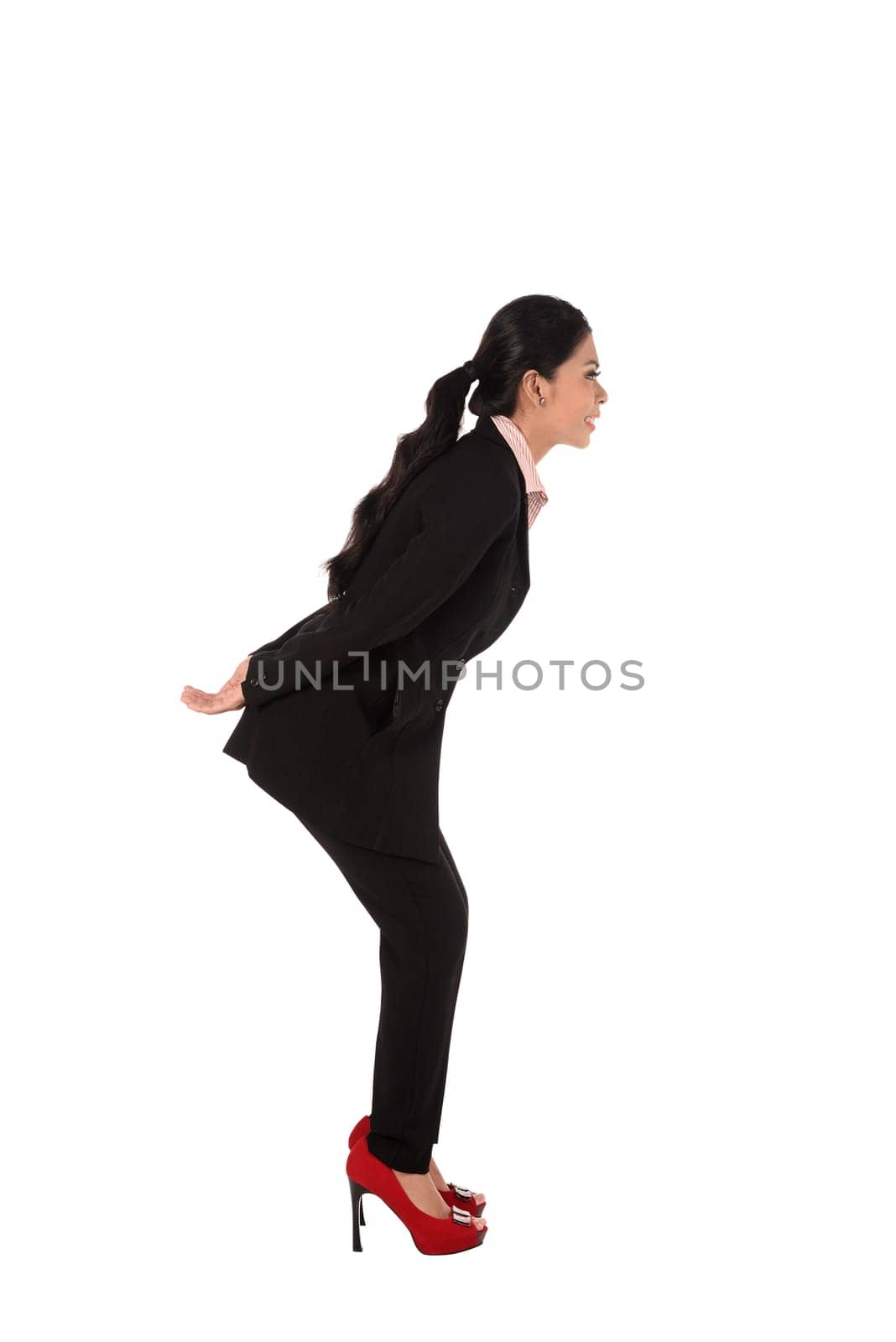 Asian young business woman carry or take something, full length isolated on white