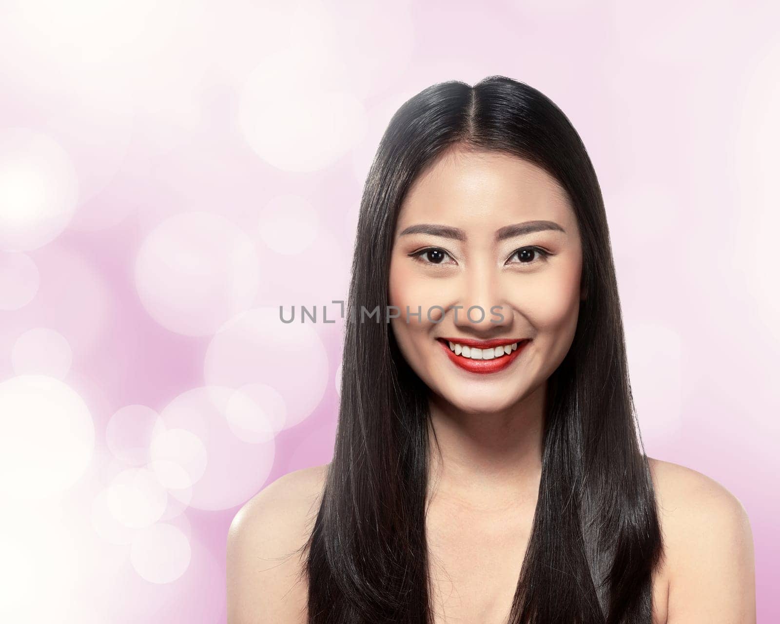 Beautiful asian woman over blur background
