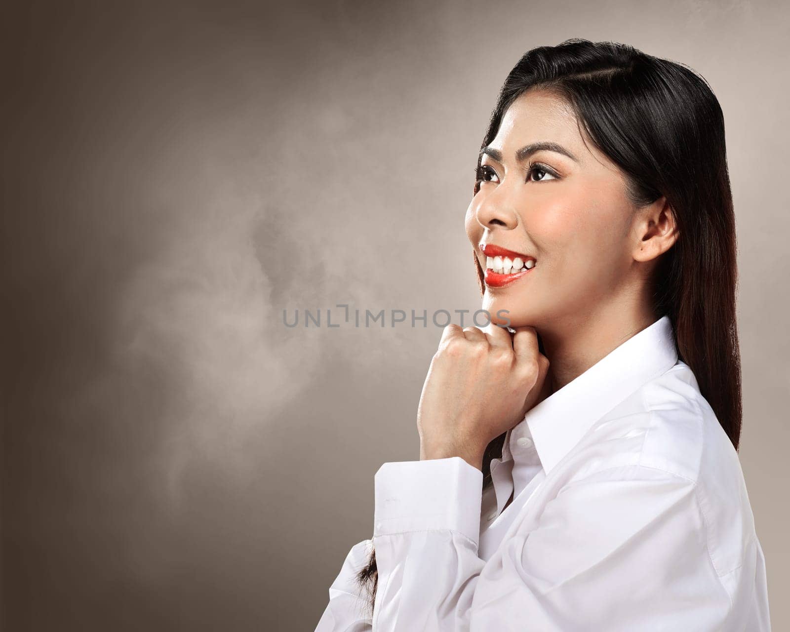 Beautiful asian woman smile over blur background
