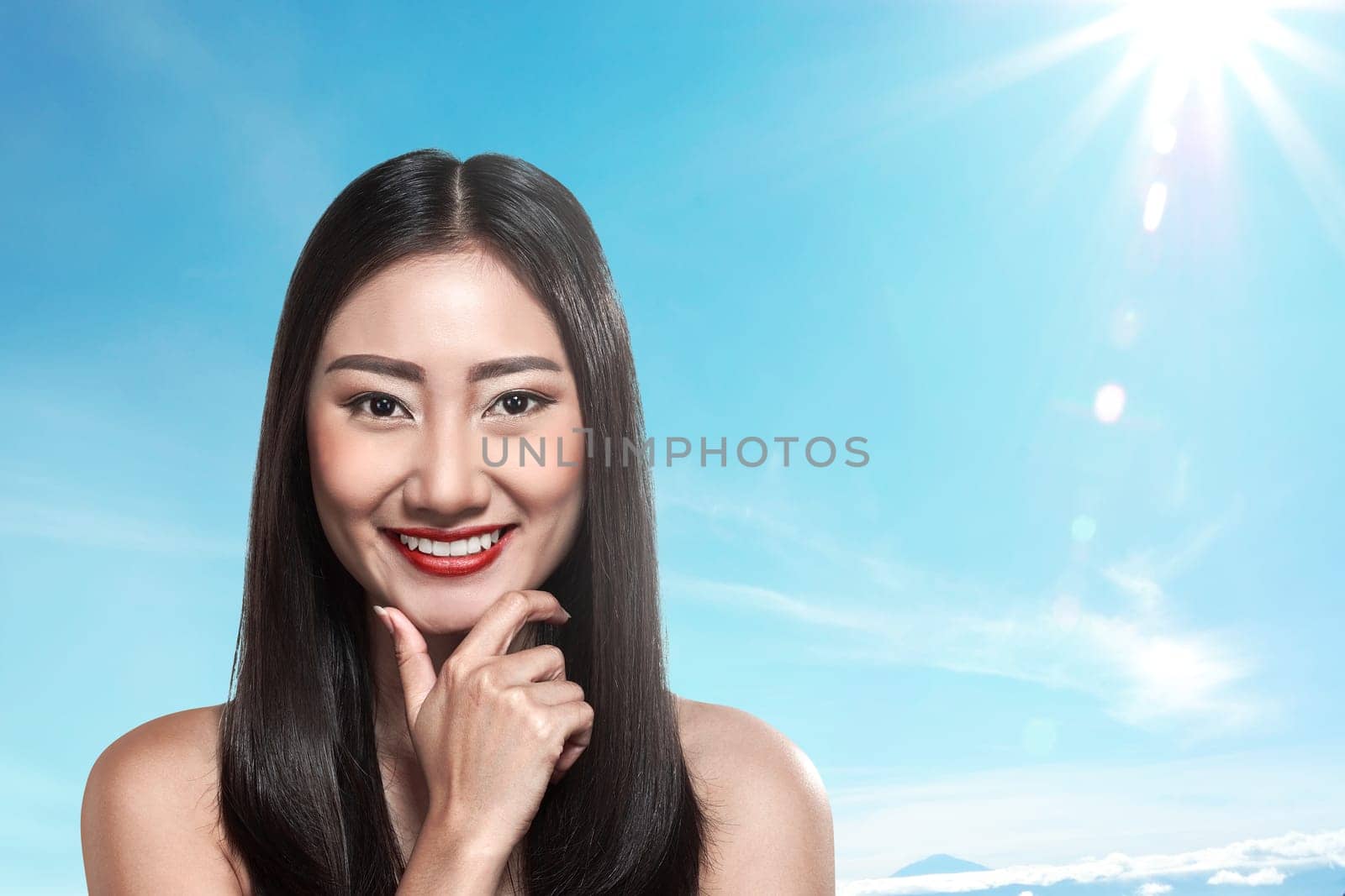 Beautiful asian woman over blur background