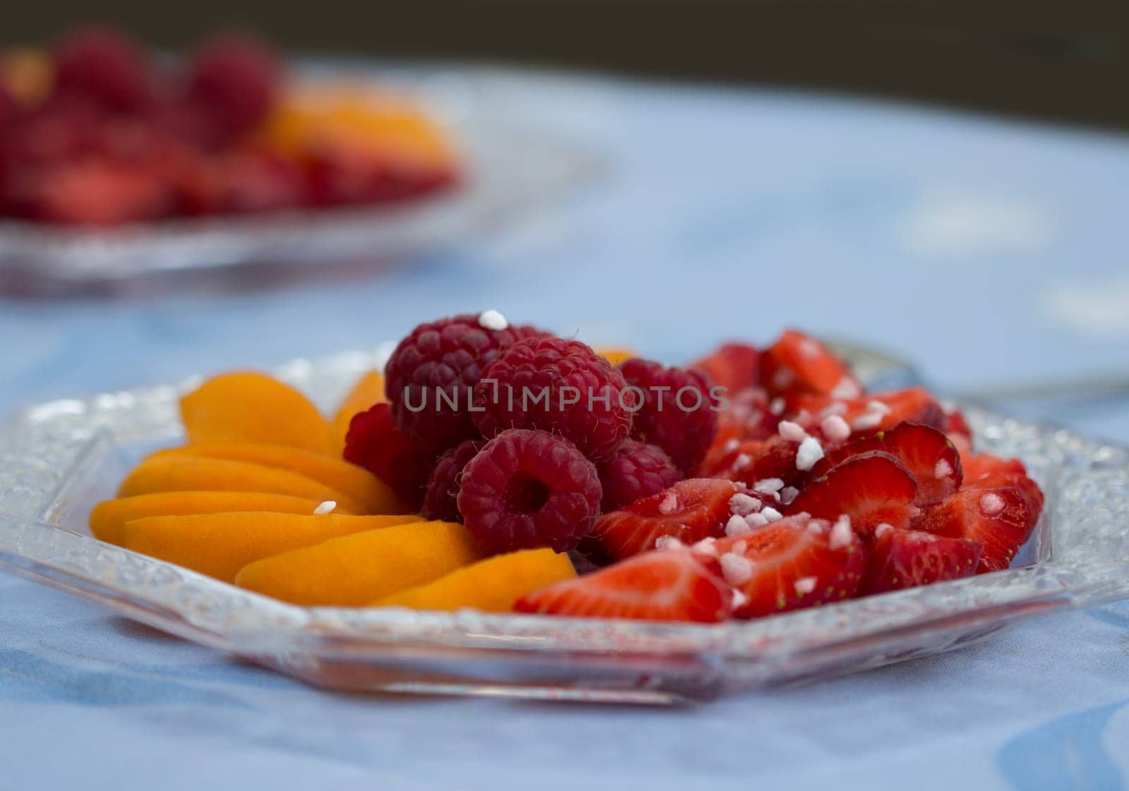 A plate of delicious fruits is available for breakfast.