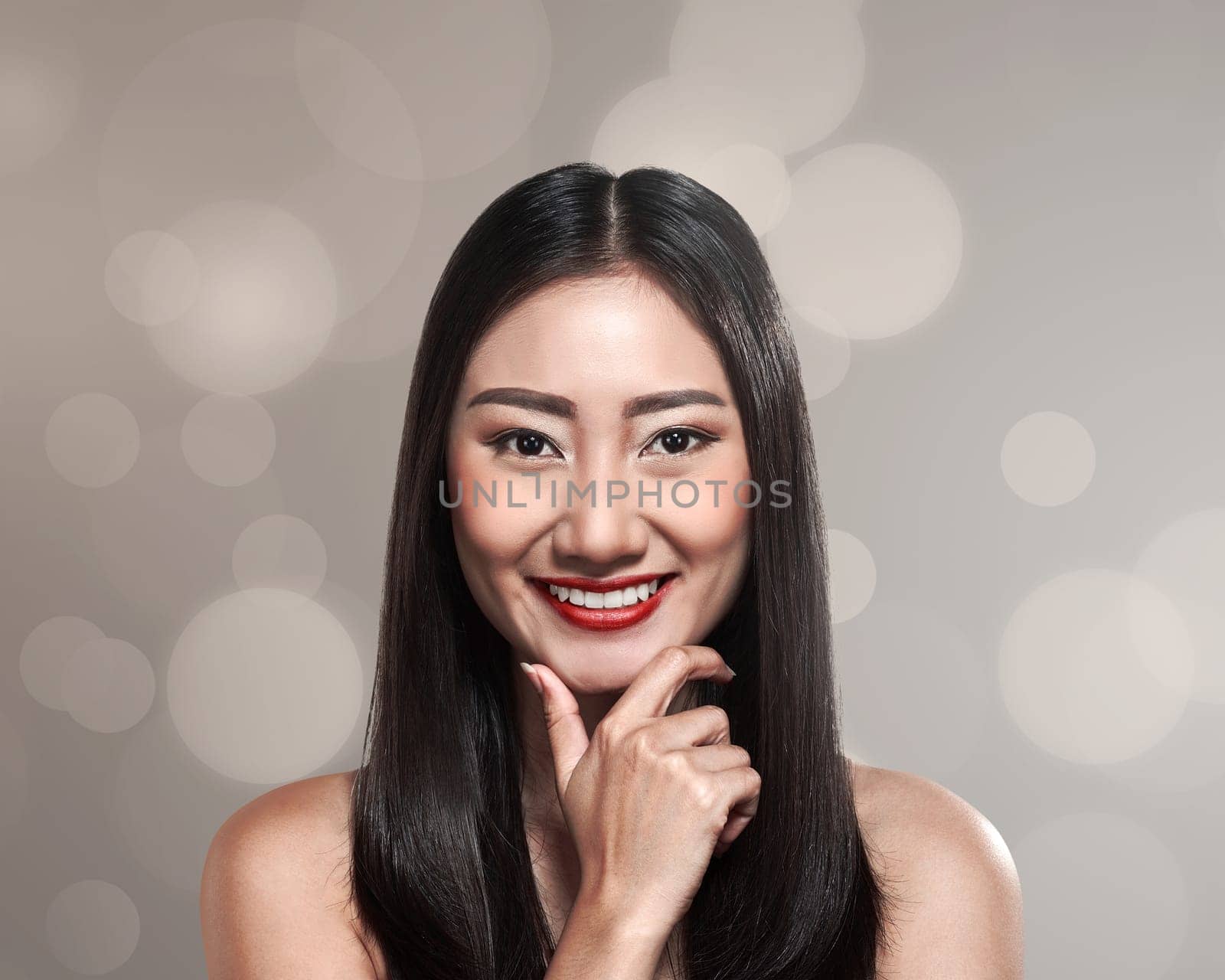 Beautiful asian woman over blur background