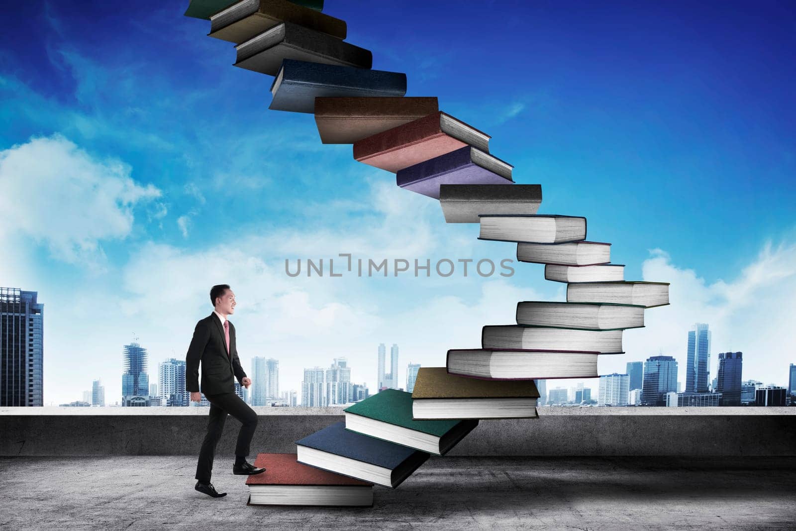 Business person step up flying book that look like stair. Career and education concept
