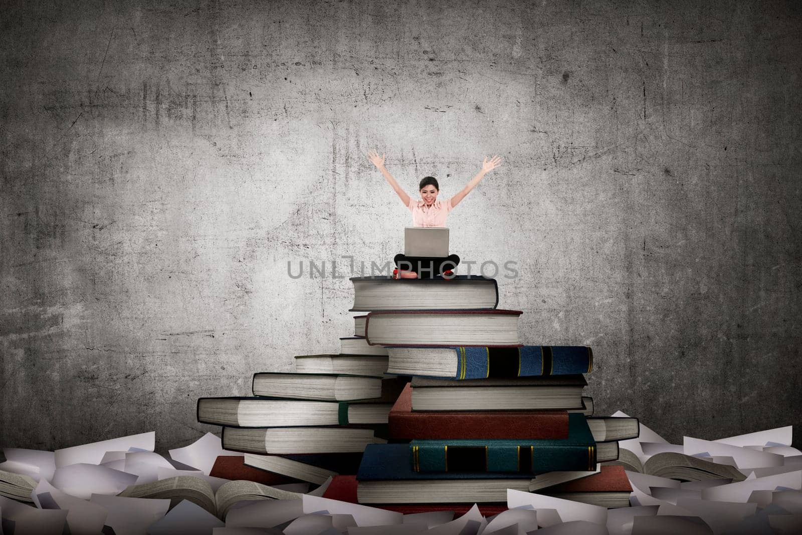 Asian business person working with laptop sit on top of book. Idea and knowledge concept