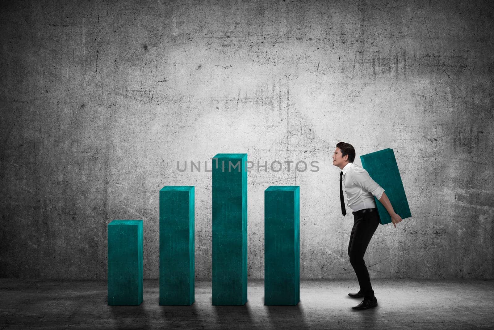 Asian business man carry heavy chart bar. Business development concept
