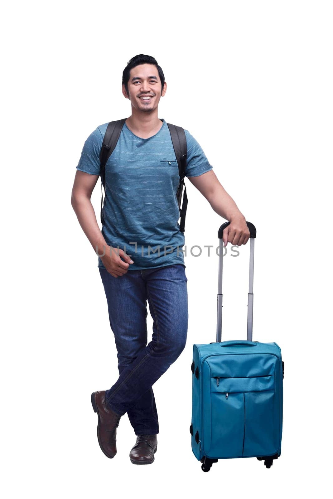 Traveler asian man standing with suitcase isolated over white background