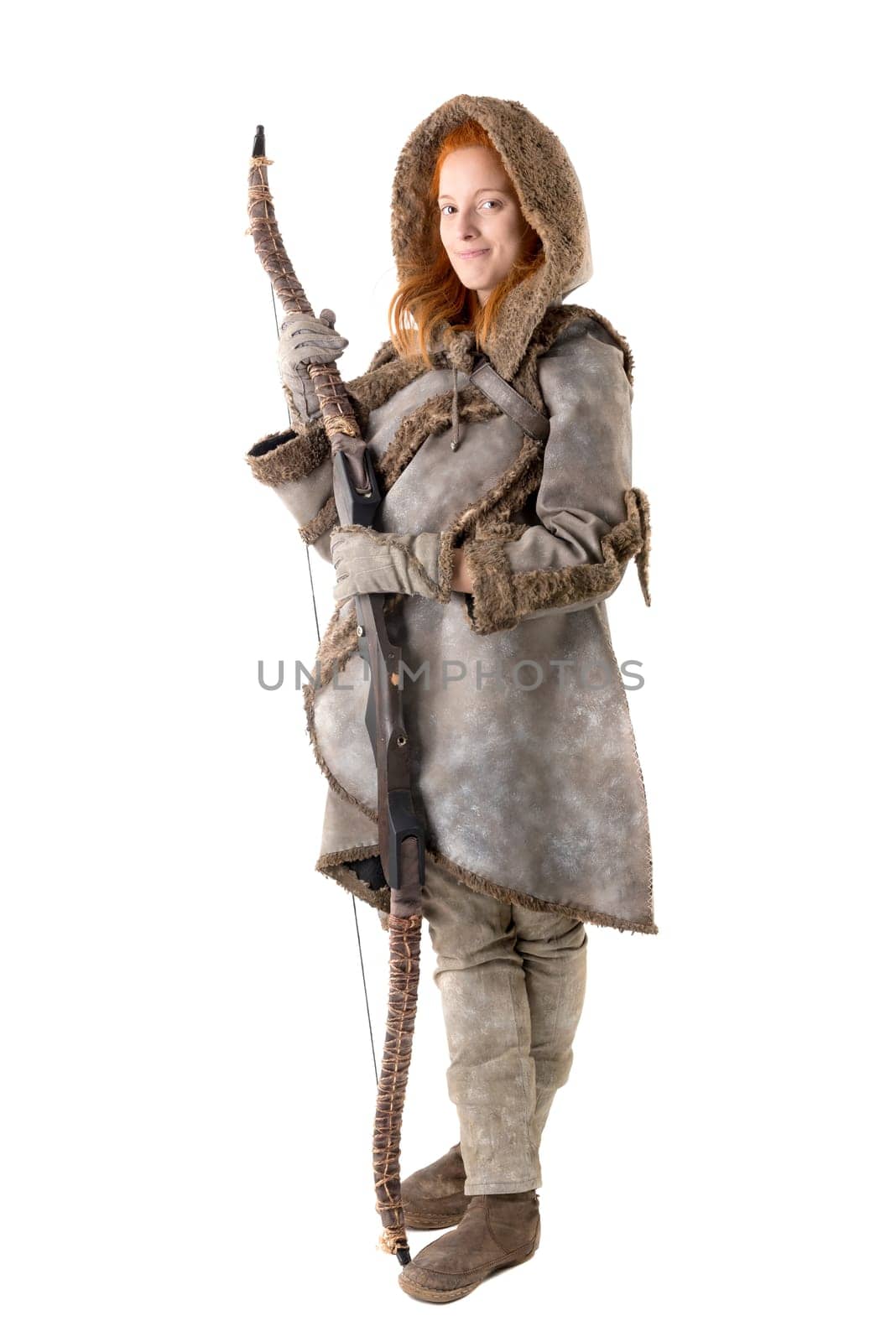 girl archer in a costume with bow isolated in white