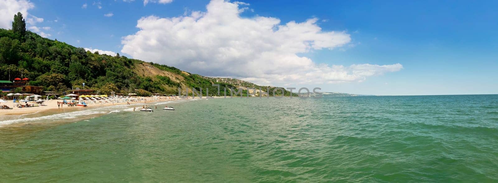 Summer vacation background at the seashore beach. Panoramic view of the coast of Black Sea, Balchik city, Bulgaria