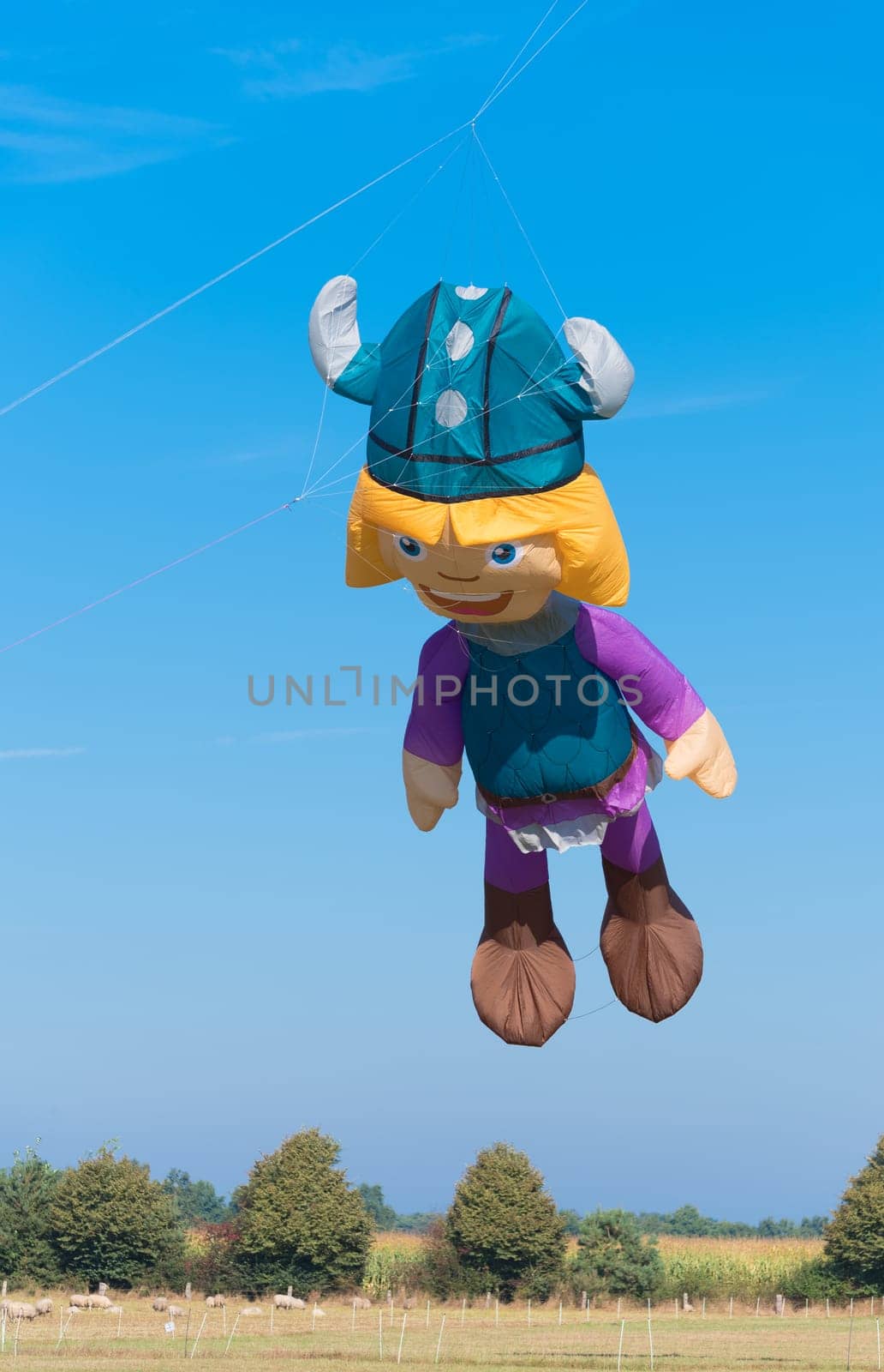 DENEKAMP, NETHERLANDS - SEPTEMBER 25, 2016: Vicke viking kite against a blue sky during a kite festival