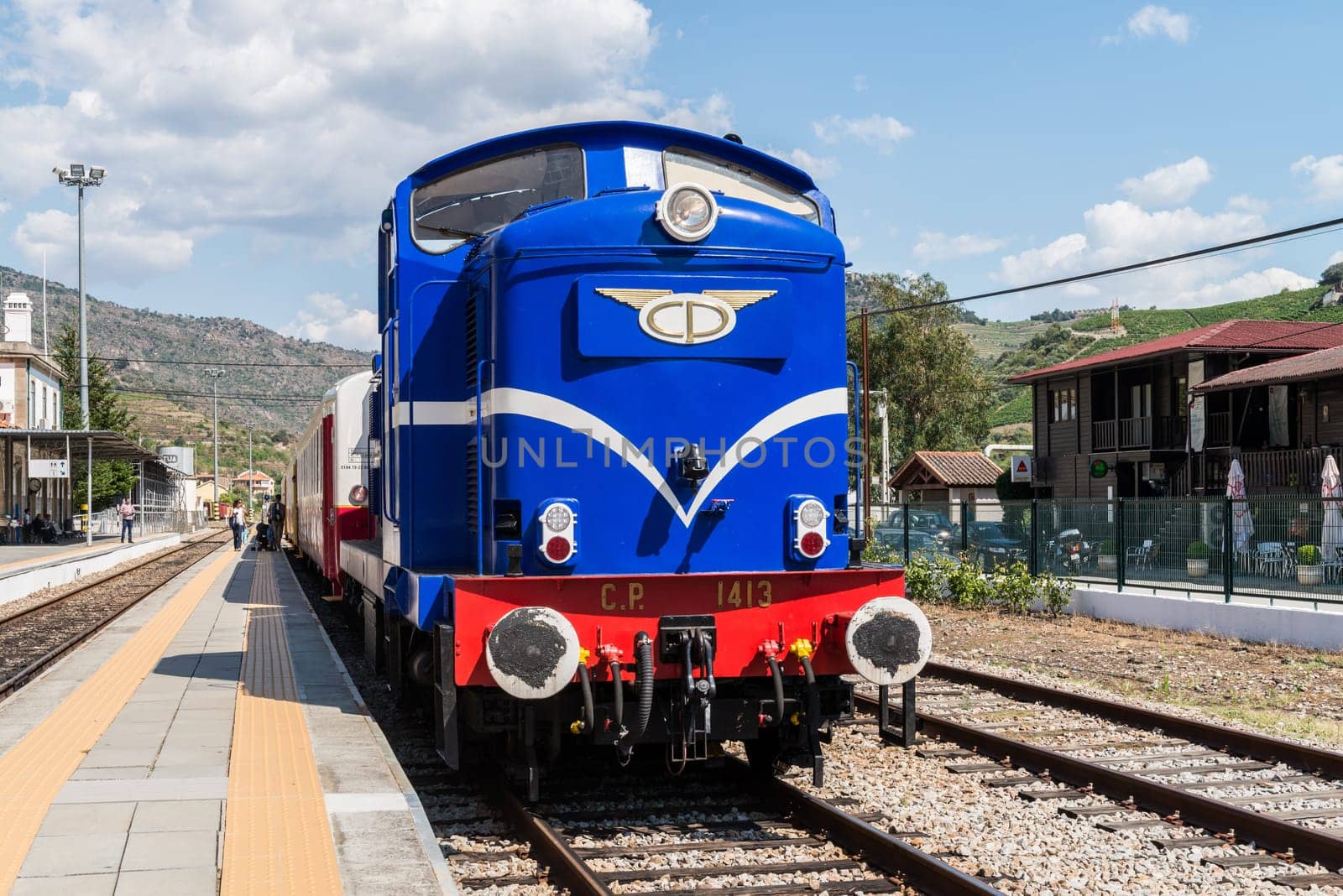TUA, PORTUGAL - JULY 08, 2017: Historic train on Tua's Train Station. The train runs between June and October along the bank of the river Douro.