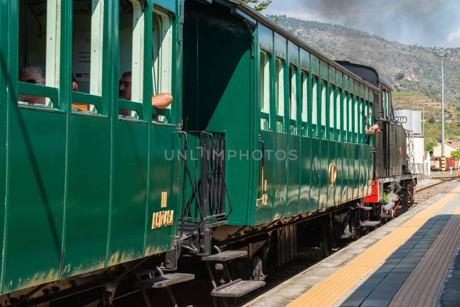 TUA, PORTUGAL - JULY 08, 2017: Historic train on Tua's Train Station. The train runs between June and October along the bank of the river Douro.