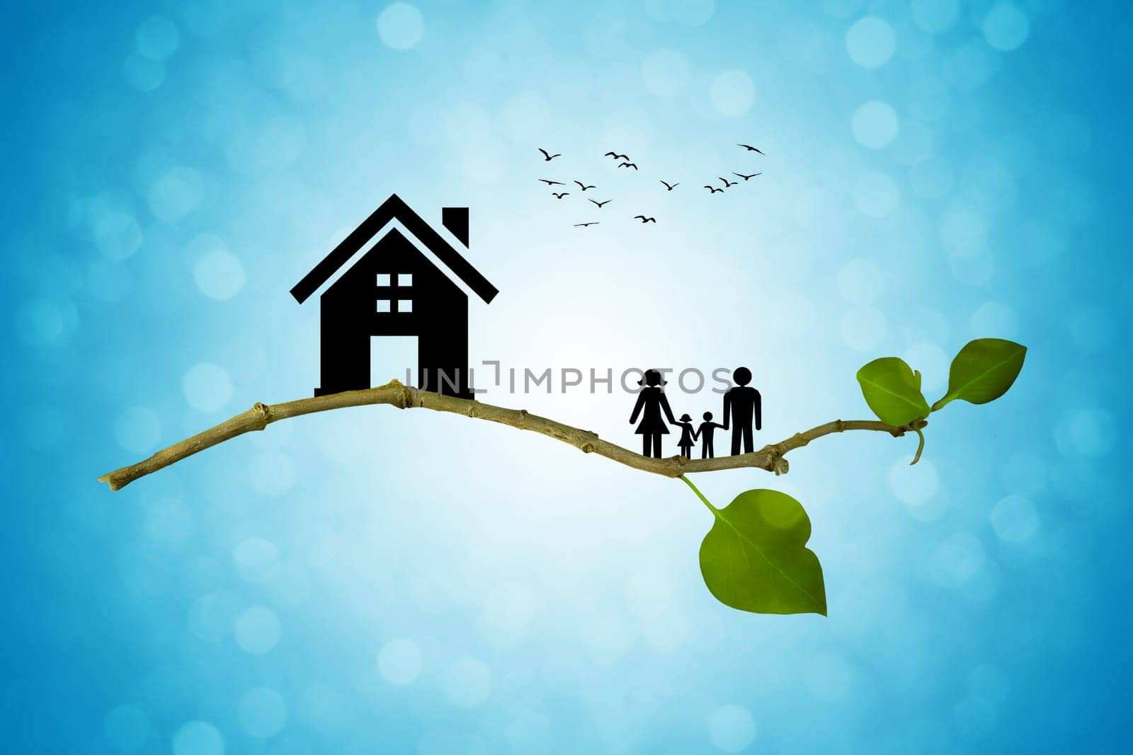 Tree branch with silhouettes of house and family. The concept of a happy family. Eco life