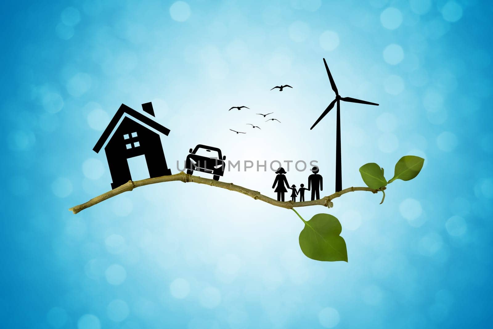 Environmental green energy concept. Silhouette of happy family, house, car and windmill on a tree branch