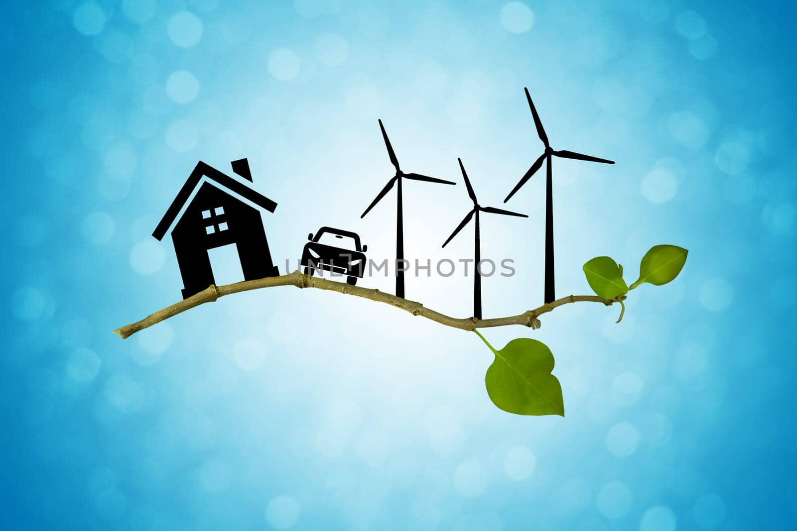 Environmental green energy concept. Silhouette of house, car and wind turbine on a tree branch