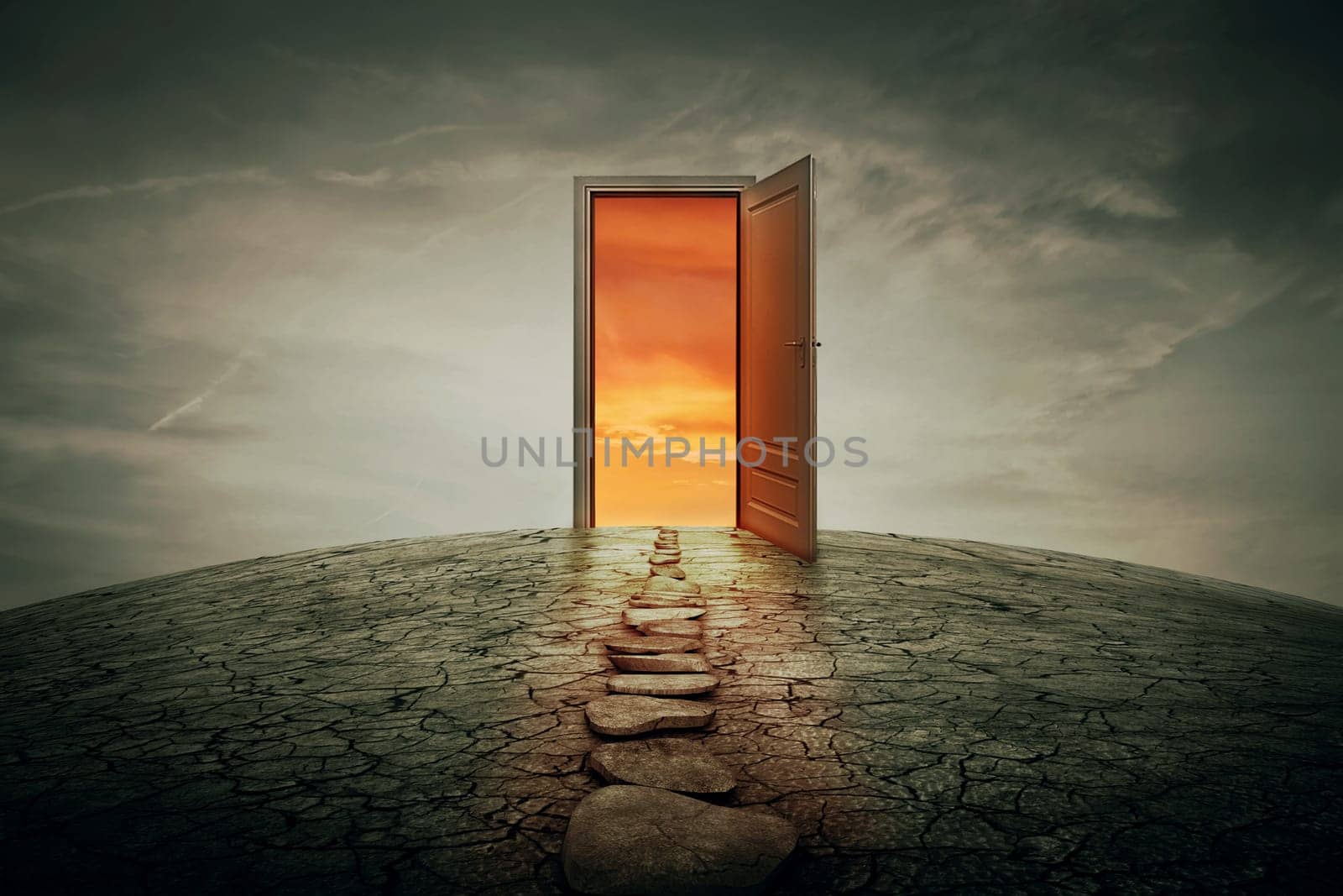 Pathway along a dry, cracked desert land, going to a opened door to another better and colorful world. Road of opportunity and success symbol. Another reality concept.