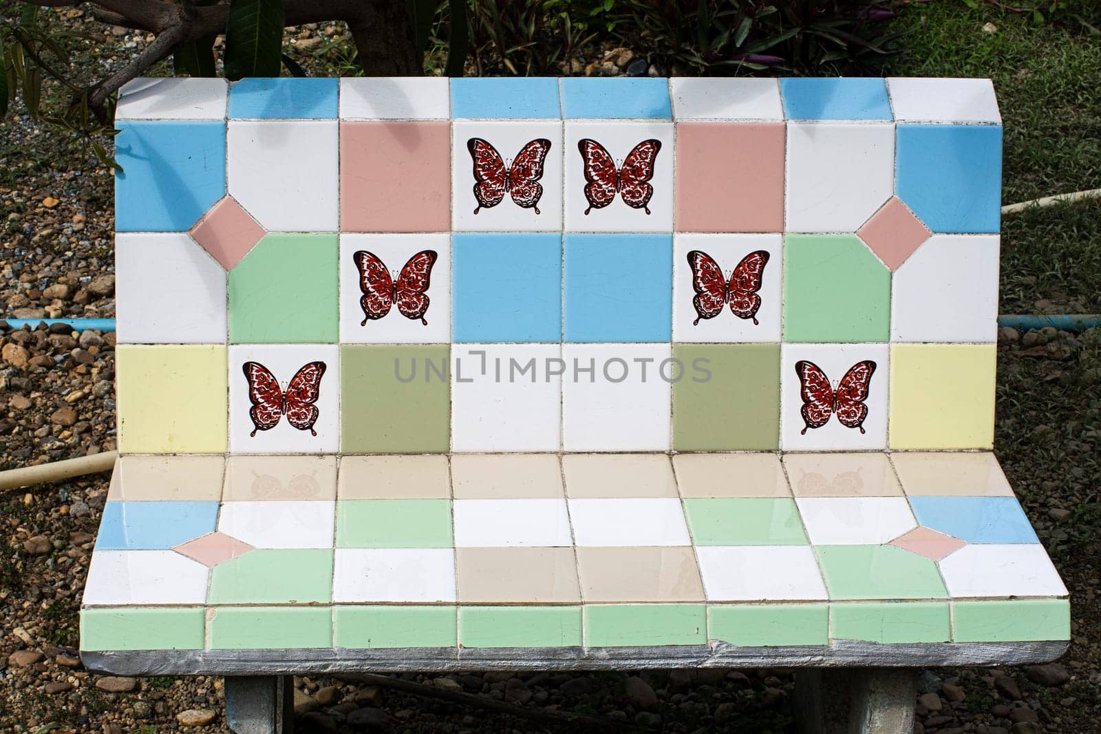 bench titles butterfly decoration detail