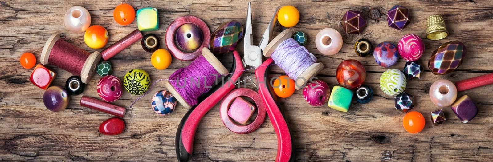 Making of handmade jewellery from colorful beads