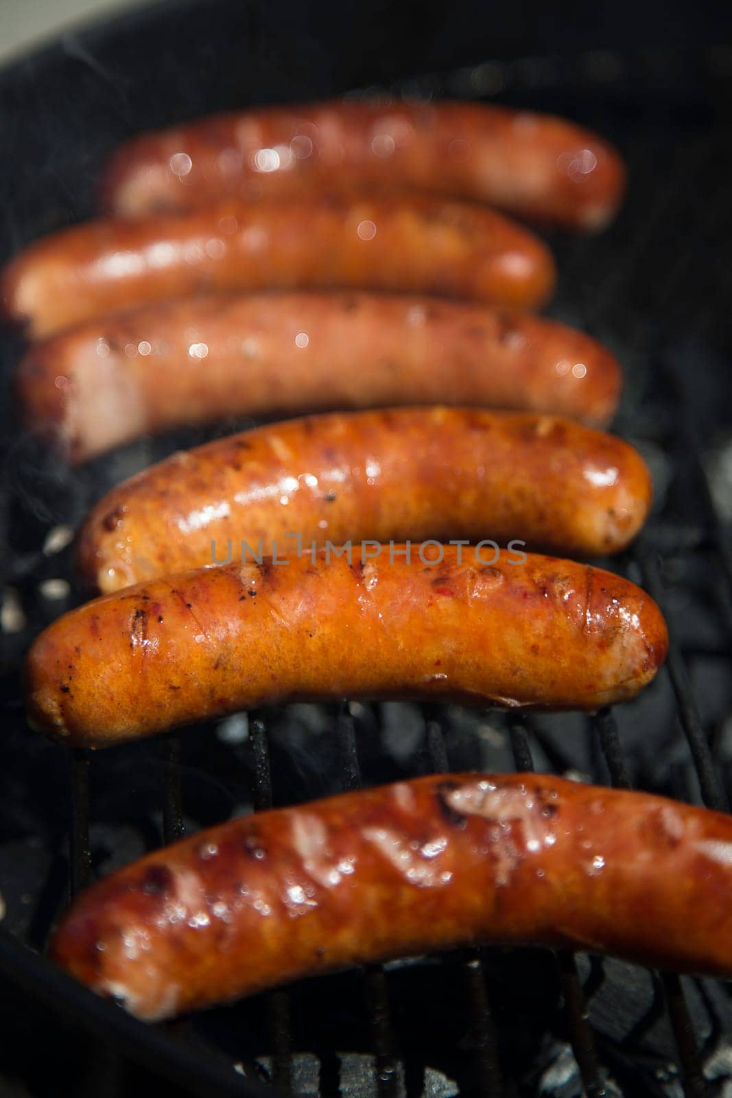Sausage on Barbecue Close Up.