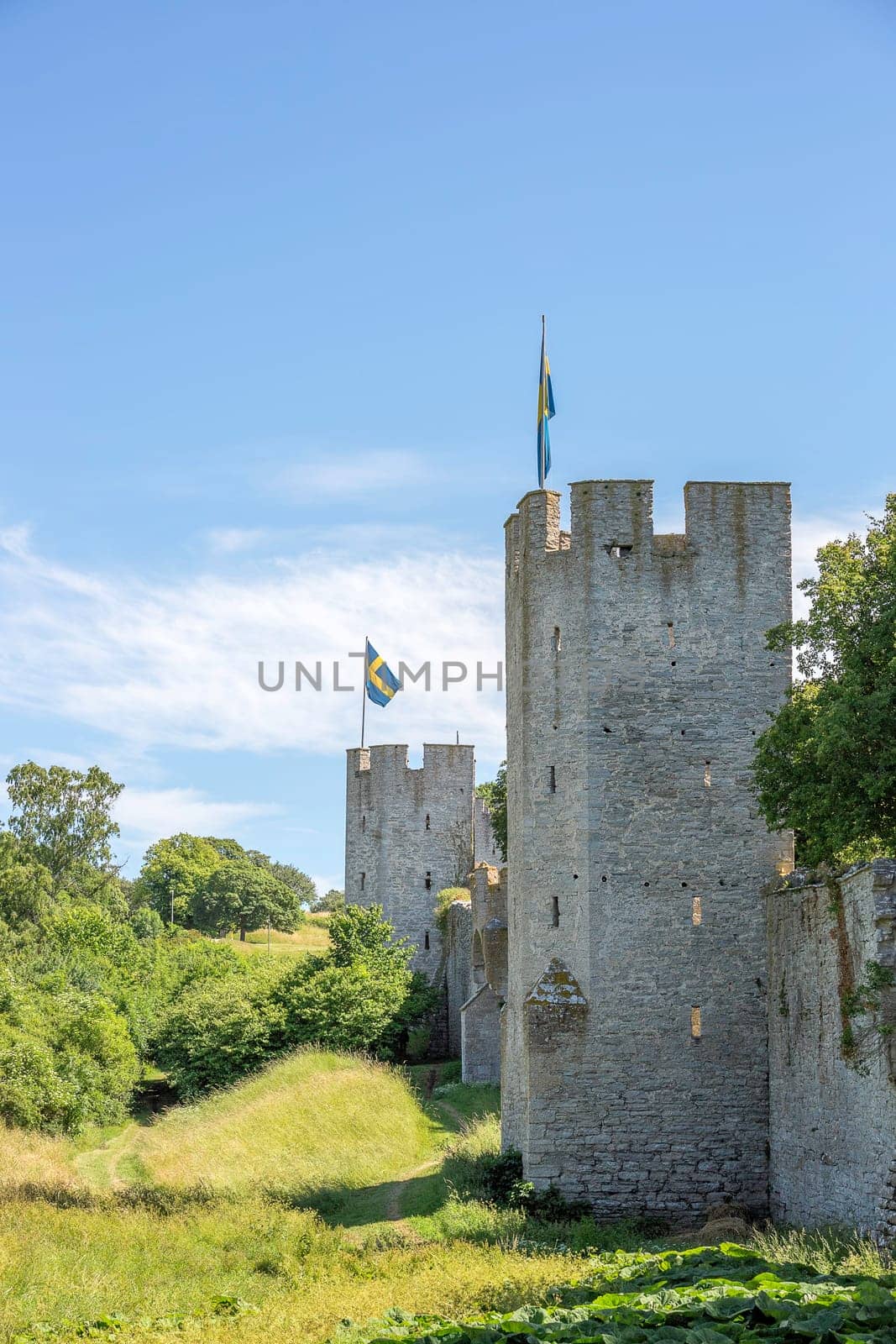Town Wall in Visby, Gotland with the Swedish flags.