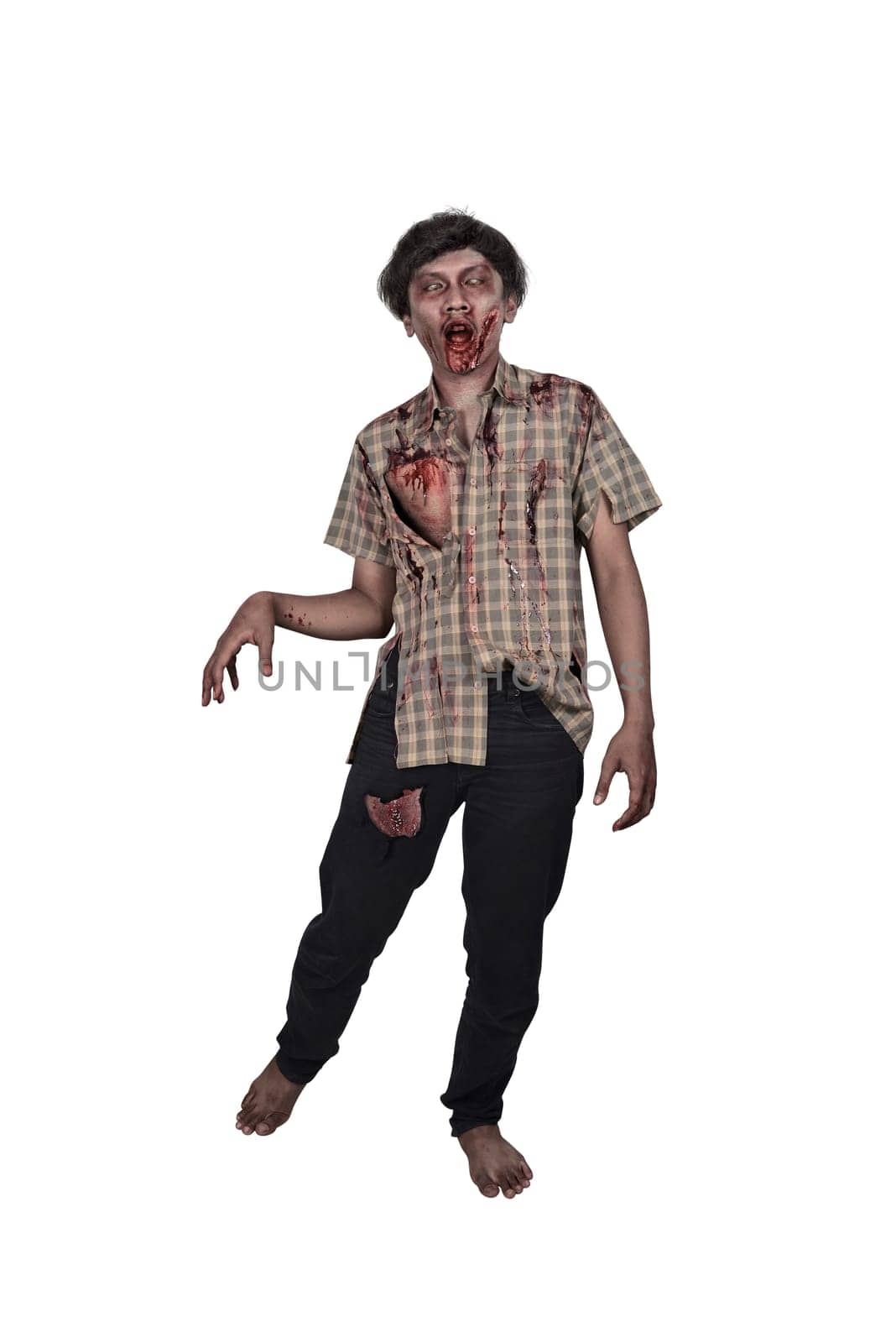 Creepy asian zombie male in clothes isolated over white background