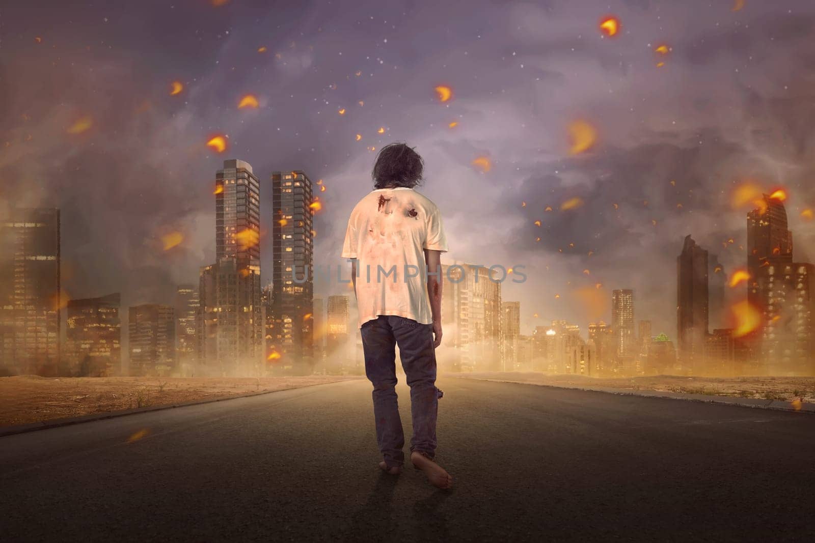 Back view of walking zombie male on the burning city